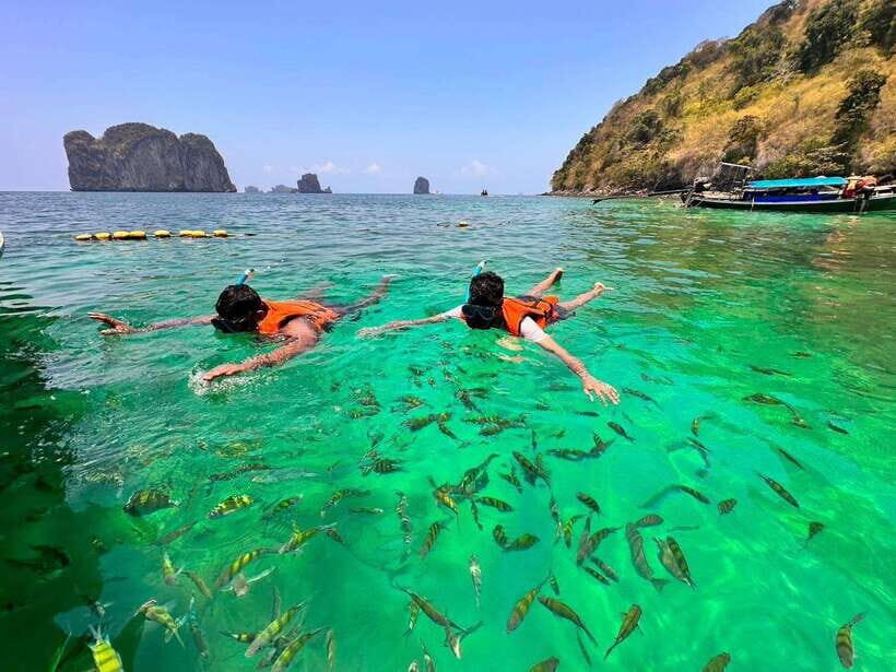 Krabi: 7 Islands Sunset Tour & BBQ & Bioluminescent Plankton - Fire show and night boat vibes: what to expect realistically
